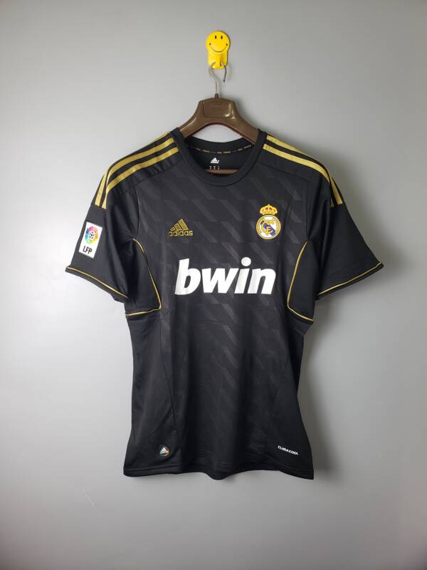 Impresionismo Comandante Estrella Camiseta alternativa retro Real Madrid 2011/12 – Trizhop